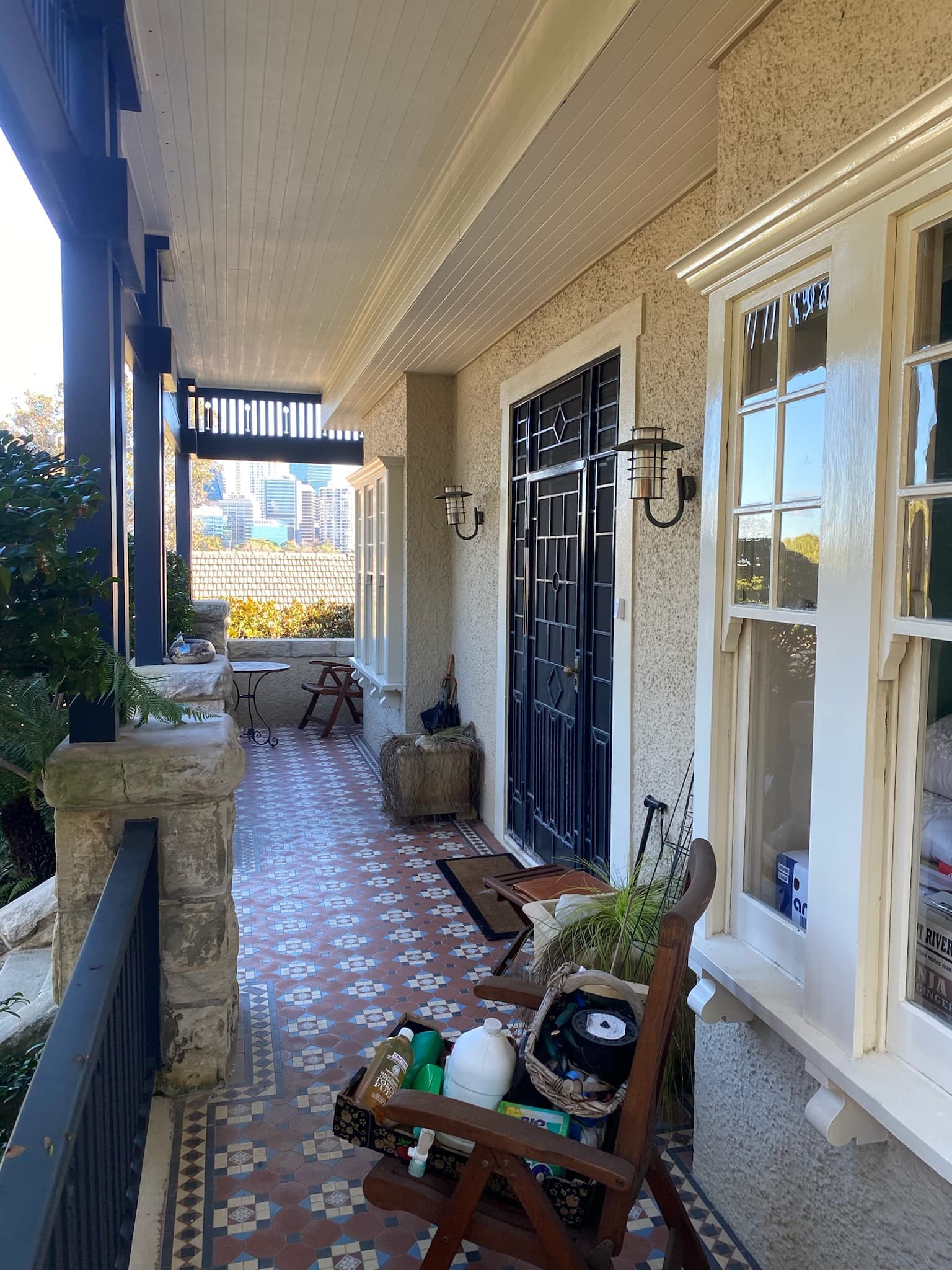 Repainted front verandah, timber windows and door of a period home