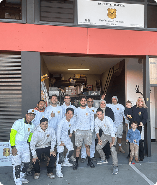 The Roberts Trading painting team outside their Matraville workshop